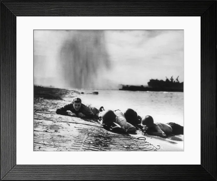 Framed Print : U.S. Coast Guardsmen and Navy beach battalion hugging the Italian beach during German bombing Framed Print : U.S. Coast Guardsmen and Navy beach battalion hugging the Italian beach during German bombing