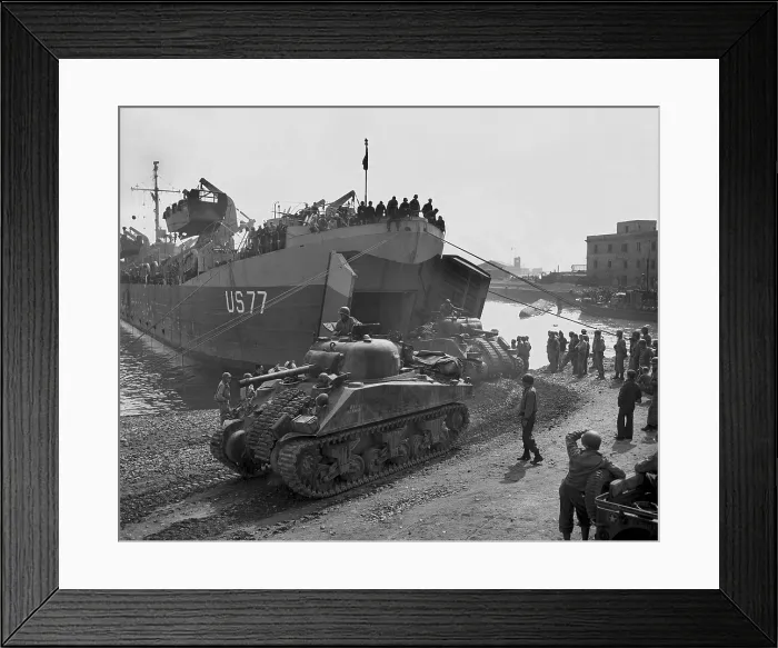 Framed Print : U.S. Sherman tanks leave a landing ship in Anzio harbor, May 1944. While costly combat continued, U.S
