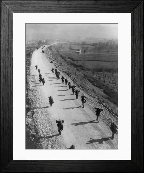 Framed Print : U.S. soldiers marching along Italy's Highway 6, south of Cassino, Jan. 31, 1944