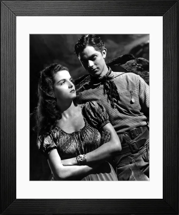 Framed Print : THE OUTLAW, from left: Jane Russell, Jack Buetel, 1943 Framed Print : THE OUTLAW, from left: Jane Russell, Jack Buetel, 1943