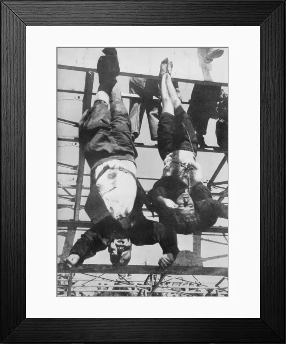 Framed Print : Executed Benito Mussolini and mistress, Clara Petacci, hanging by feet. Milan, Italy, May 1945. World War 2. (BSLOC_2014_10_54) Framed Print : Executed Benito Mussolini and mistress, Clara Petacci, hanging by feet. Milan, Italy, May 1945. World War 2. (BSLOC_2014_10_54)