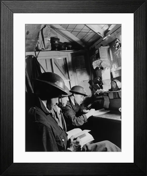 Framed Print : Teenagers manned the Air Warden's post in a South East London Shelter during World War 2. Ca. 1940-1945. (BSLOC_2014_10_61)