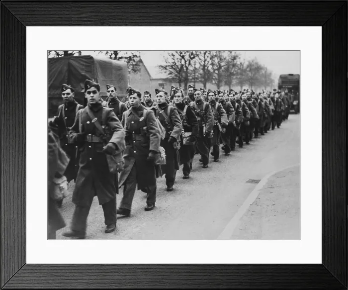 Framed Print : Canadian soldiers marching on a road in England in 1940, in the first year of World War 2. (BSLOC_2014_10_67) Framed Print : Canadian soldiers marching on a road in England in 1940, in the first year of World War 2. (BSLOC_2014_10_67)