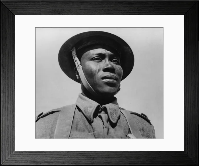 Framed Print : A Free French infantryman, native of the Chad colony, who was awarded the Croix de Guerre. Note the tribal scarification of his face. Ca. 1942. World War 2. (BSLOC_2014_10_70)