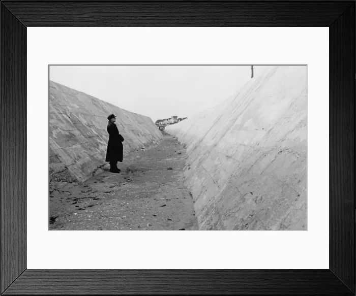 Framed Print : German soldier in an anti-tank ditch on the Atlantic Wall north of Caen, France. 1944. World War 2. (BSLOC_2014_10_72) Framed Print : German soldier in an anti-tank ditch on the Atlantic Wall north of Caen, France. 1944. World War 2. (BSLOC_2014_10_72)