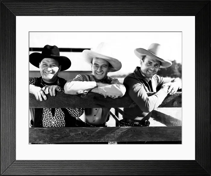 Framed Print : OVERLAND STAGE RAIDERS, from left, Max Terhune, John Wayne, Ray Corrigan, 1938 Framed Print : OVERLAND STAGE RAIDERS, from left, Max Terhune, John Wayne, Ray Corrigan, 1938