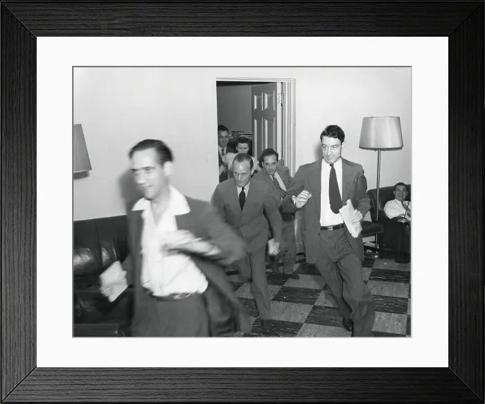 Framed Print : Reporters running through the White House after the announcement of Japan's surrender, ending WW2. August 14, 1945. - (BSLOC_2014_15_21) Framed Print : Reporters running through the White House after the announcement of Japan's surrender, ending WW2. August 14, 1945. - (BSLOC_2014_15_21)