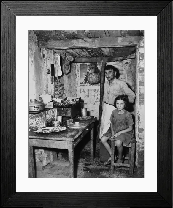 Framed Print : Father and daughter in sparse refugee quarters during the Greek Civil War. August 29, 1947. - (BSLOC_2014_15_225) Framed Print : Father and daughter in sparse refugee quarters during the Greek Civil War. August 29, 1947. - (BSLOC_2014_15_225)