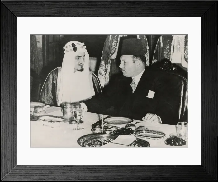 Framed Print : Prince Faisal l bin Abdulaziz of Saudi Arabia and King Farouk of Egypt. They dine at Ras el-Tin Palace in Alexandria following a meeting of the Arab League, April 9, 1946