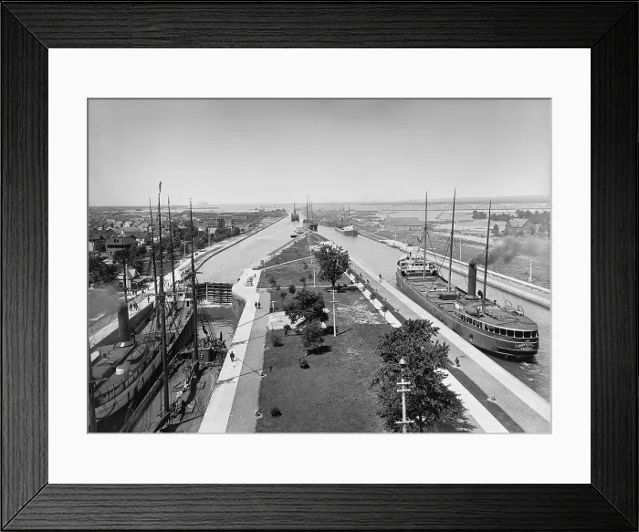 Framed Print : Cargo ships passing through the locks of the Sault Sainte Marie Canal which bypasses the rapids on the St. Marys River linking Lake Superior and Lake Heron. Ca. 1895. LC-D4-11306 Framed Print : Cargo ships passing through the locks of the Sault Sainte Marie Canal which bypasses the rapids on the St. Marys River linking Lake Superior and Lake Heron. Ca. 1895. LC-D4-11306