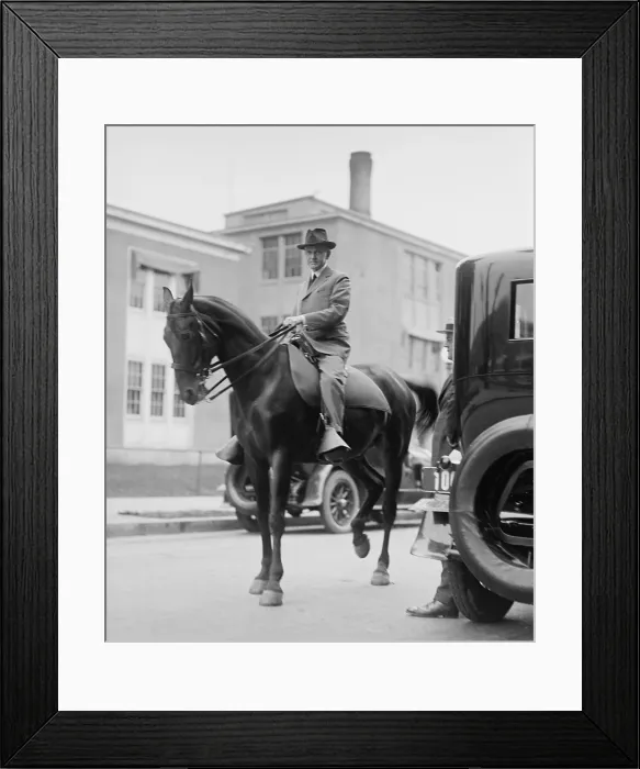 Framed Print : President Calvin Coolidge on horseback in Washington, D.C. street on Aug. 18, 1923. (BSLOC_2015_15_150)