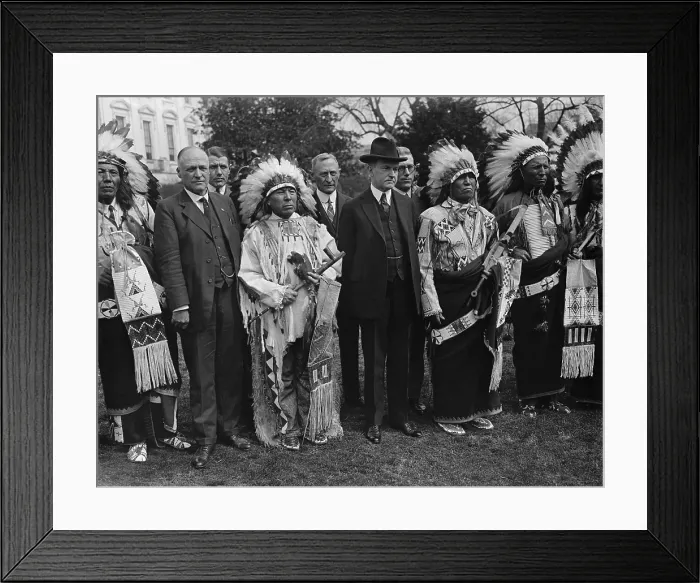 Framed Print : President Calvin Coolidge (center, left) poses with costumed Native American at the White House. Ca. 1923-28
