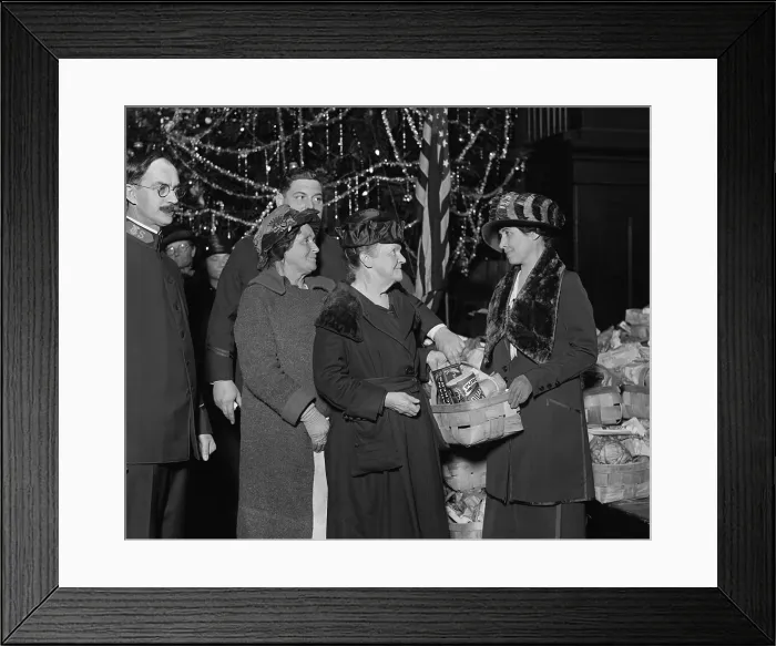 Framed Print : First Lady Grace Coolidge with Salvation Army Group, Dec. 24, 1923. She holds a food basket containing Quaker Oats and Graham Crackers and other staples. (BSLOC_2015_15_154)