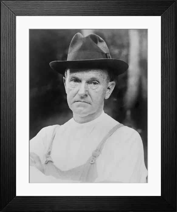 Framed Print : Calvin Coolidge in his farmer's work clothes. During his summer vacation from Washington, D.C. he helped his father on his farm in Plymouth, Vermont. Ca. 1924 Framed Print : Calvin Coolidge in his farmer's work clothes. During his summer vacation from Washington, D.C. he helped his father on his farm in Plymouth, Vermont. Ca. 1924