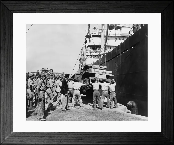 Framed Print : American-made truck lowered from a freighter at Piraeus as part of a relief effort to Greece. U.S