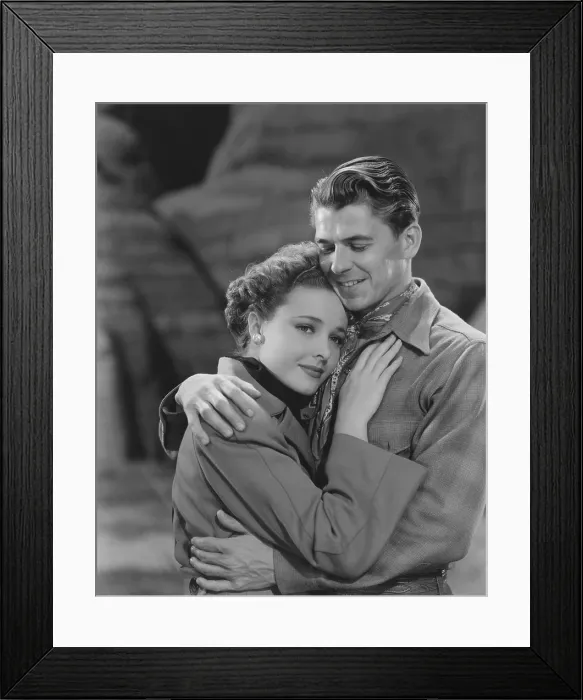 Framed Print : THE BAD MAN, from left: Laraine Day, Ronald Reagan, 1941