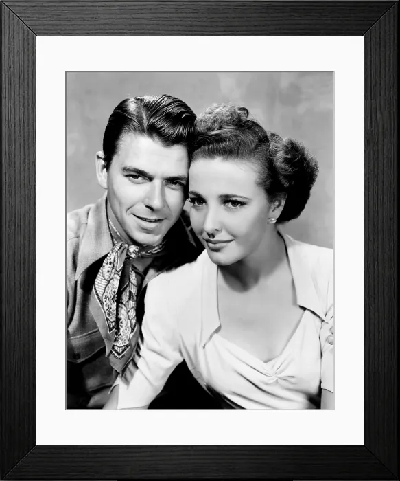 Framed Print : THE BAD MAN, from left, Ronald Reagan, Laraine Day, 1941