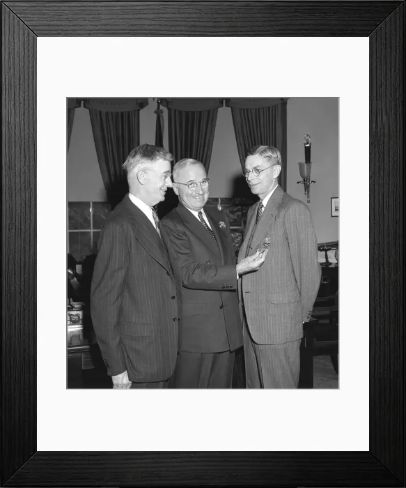 Framed Print : President Harry Truman, center, presenting chemist Dr. James Conant with the Medal of Merit and Bronze Oak Leaf Cluster. Dr. Vannevar Bush stands at left