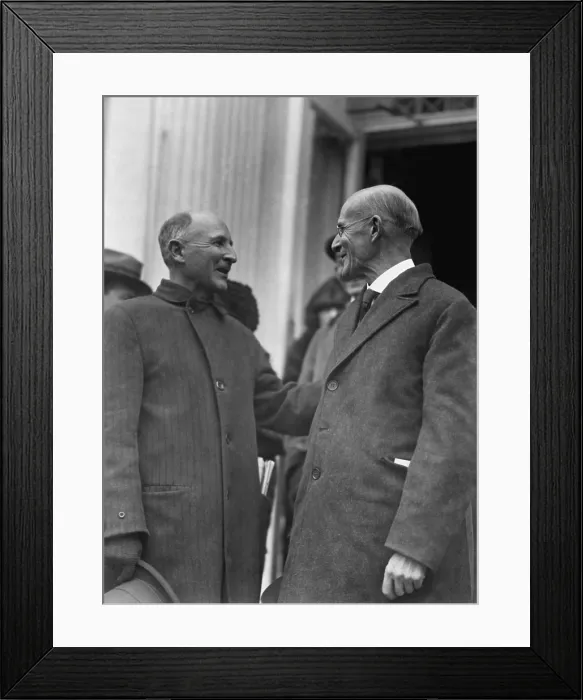Framed Print : Eugene Debs (right) facing his brother Theodore upon his release from Atlanta Federal Penitentiary. President Warren G