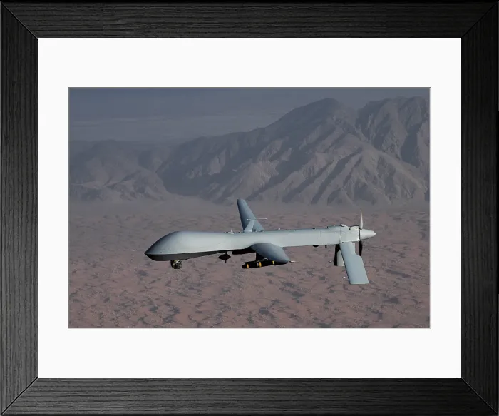 Framed Print : The Predator drone carries various sensors cameras and Hellfire missiles. Since 1995 it has been used over Afghanistan Pakistan Bosnia Serbia Iraq Yemen and Libya. Dec. 16 2008