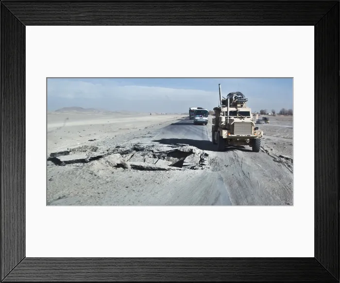 Framed Print : An improvised explosive device blast in a road near the village of Nawa Afghanistan Nov. 22 2010. Photo by:Everett Collection(BSLOC_2011_6_61)