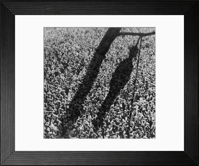 Framed Print : Lynching. The shadow of lynching painted over a crowd of white people