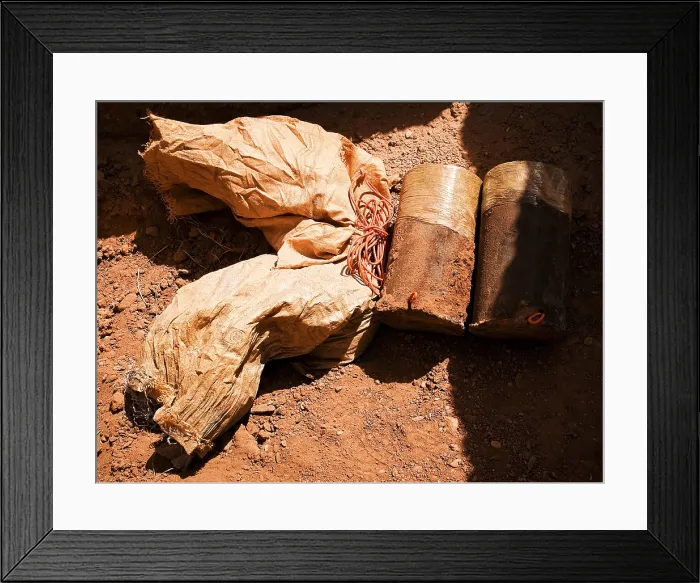 Framed Print : Materials for making an improvised explosive device IED found Helmand province Afghanistan include two 35 pound IED 15 feet of detonation cord