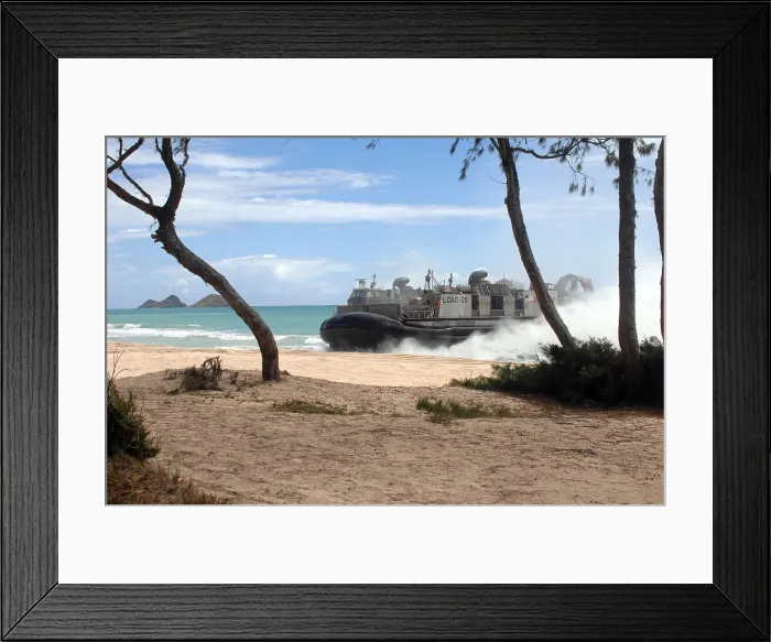 Framed Print : High-speed over-the-beach amphibious landing craft approaching a beach on an air cushion that allows a dry beach landing Framed Print : High-speed over-the-beach amphibious landing craft approaching a beach on an air cushion that allows a dry beach landing