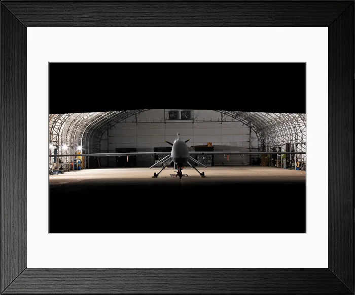 Framed Print : Predator drone an unmanned aircraft can remain in flight for 24 hours and conduct surveillance and missile attacks while remotely guided by human operators in a distant location