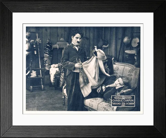 Framed Print : BEHIND THE SCREEN, (aka THE PRIDE OF HOLLYWOOD'), from left: Charles Chaplin (aka Charlie Chaplin'), Edna Purviance on lobbycard, 1916 Framed Print : BEHIND THE SCREEN, (aka THE PRIDE OF HOLLYWOOD'), from left: Charles Chaplin (aka Charlie Chaplin'), Edna Purviance on lobbycard, 1916