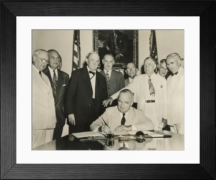 Framed Print : President Harry Truman signs the Atlantic Pact on July 27, 1949. Behind Truman, Standing, L-R: Sen. Walter George; Def. Sec. Louis Johnson; Sen. Tom Connally; Sec