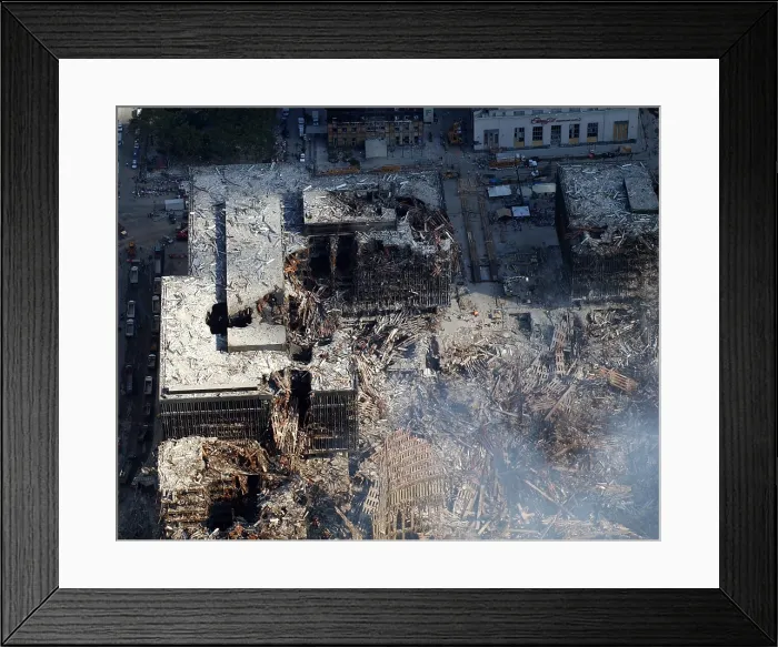 Framed Print : Ruins of the collapsed World Trade Center buildings following the 9 / 11 terrorists attacks in New York City. Sept. 19 2001, Photo by: Everett Collection