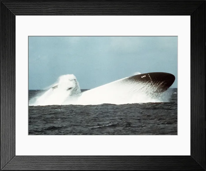 Framed Print : The nuclear-powered attack submarine BIRMINGHAM conducting an emergency surfacing exercise during sea trials. Nov. 19 1978. (BSLOC_2011_12_250)