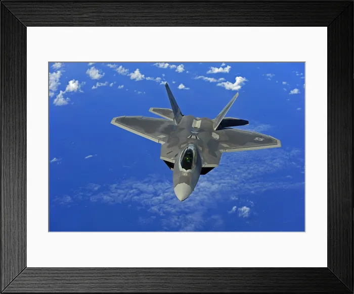 Framed Print : F-22 Raptor fighter flies near Guam. Introduced in 2005 it has speed agility precision stealth technology and a price tag of 150 million. Feb. 16 2010. (BSLOC_2011_12_225)
