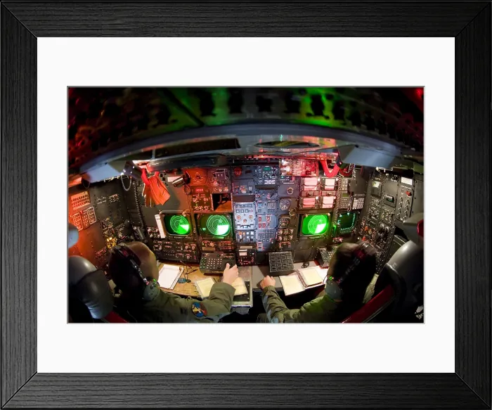 Framed Print : Officers at the console on the lower deck of a B-52. August 21 2006. B-52s were introduced in 1955 and with continuous modifications are still in combat. July 10 2010
