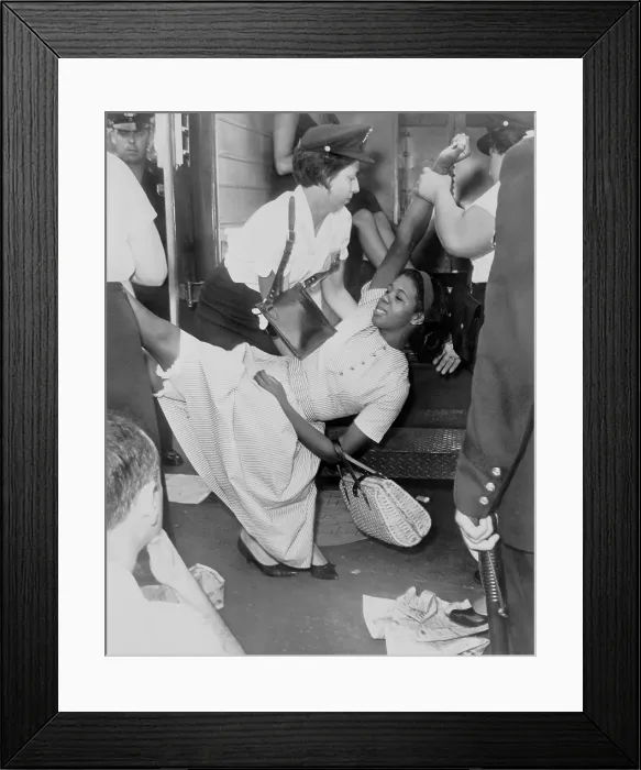 Framed Print : African American woman resisting her arrest as she is carried to a paddy wagon during a civil rights demonstration in Brooklyn, New York Framed Print : African American woman resisting her arrest as she is carried to a paddy wagon during a civil rights demonstration in Brooklyn, New York