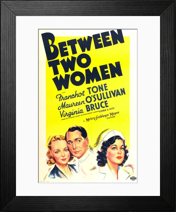 Framed Print : BETWEEN TWO WOMEN, from left on US poster art: Virginia Bruce, Franchot Tone, Maureen O'Sullivan, 1937