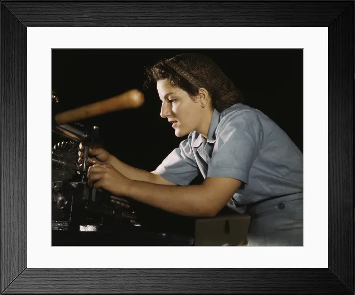 Framed Print : Women war worker finishing airplane parts in a hand mill at Consolidated Aircraft Corporation in Fort Worth, Texas. October 1942