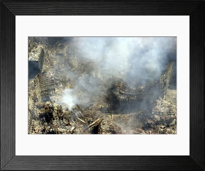 Framed Print : At Ground Zero in New York City the ruins of the World Trade Center continue to burn 4 days after the 9 / 11 terrorists attacks. Sept Framed Print : At Ground Zero in New York City the ruins of the World Trade Center continue to burn 4 days after the 9 / 11 terrorists attacks. Sept