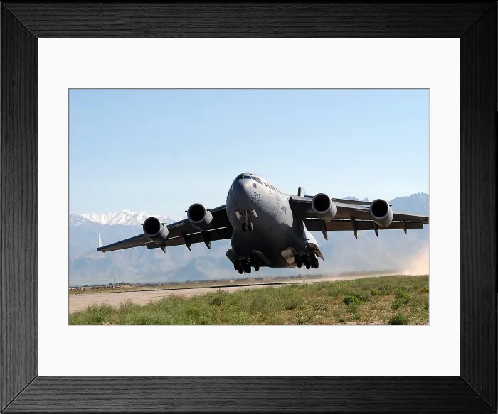Framed Print : U.S. Air Force Globemaster transport aircraft takes off at Bagram Air Field Afghanistan. Bagram served as a Soviet air base in the 1980s and was a key base for U.S