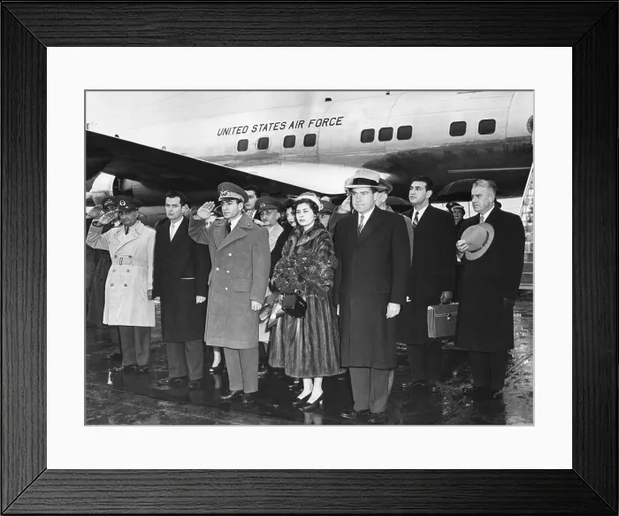 Framed Print : Shah of Iran and his second wife, Queen Soraya, arrive at National Airport. VP Nixon headed the welcoming party. Dec. 13, 1954. - (BSLOC_2014_16_204) Framed Print : Shah of Iran and his second wife, Queen Soraya, arrive at National Airport. VP Nixon headed the welcoming party. Dec. 13, 1954. - (BSLOC_2014_16_204)