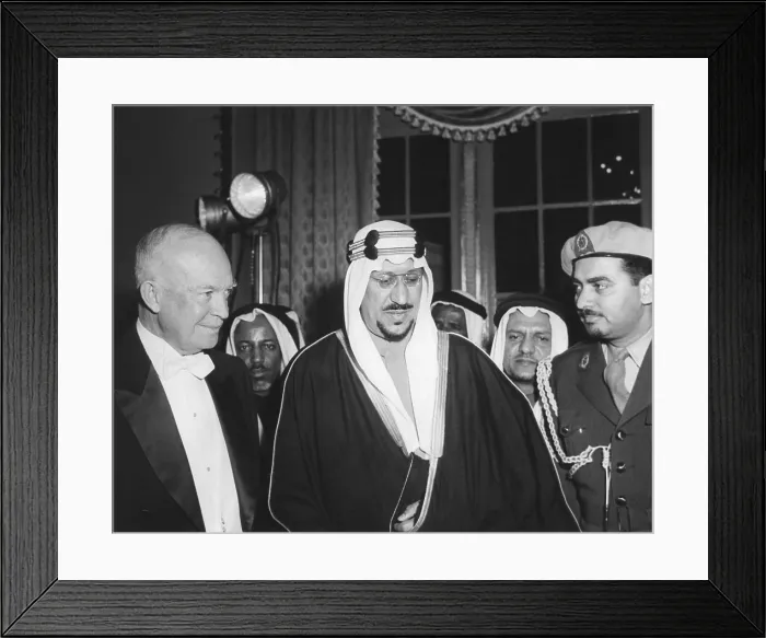Framed Print : President Eisenhower with Saudi Arabia King, Saud ibn abd al-Aziz Al-Saud and his interpreter. They are at a dinner in the King's honor at the Mayflower Hotel. Feb. 1, 1957