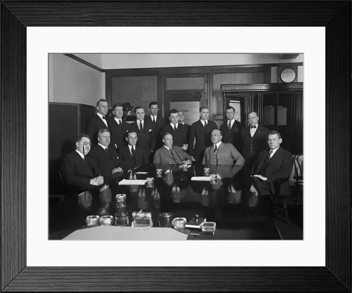 Framed Print : Director Charles R. Forbes, of the U.S. Veterans Bureau holding a conference with his staff. Forbes is seated center left in grey suit. Ca. Jan-Feb 1923 Framed Print : Director Charles R. Forbes, of the U.S. Veterans Bureau holding a conference with his staff. Forbes is seated center left in grey suit. Ca. Jan-Feb 1923