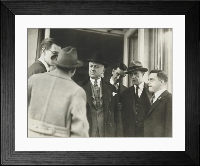 Framed Print : Atty. Gen. Harry Daugherty questioned by newsmen as he left a cabinet meeting, Feb. 26, 1924