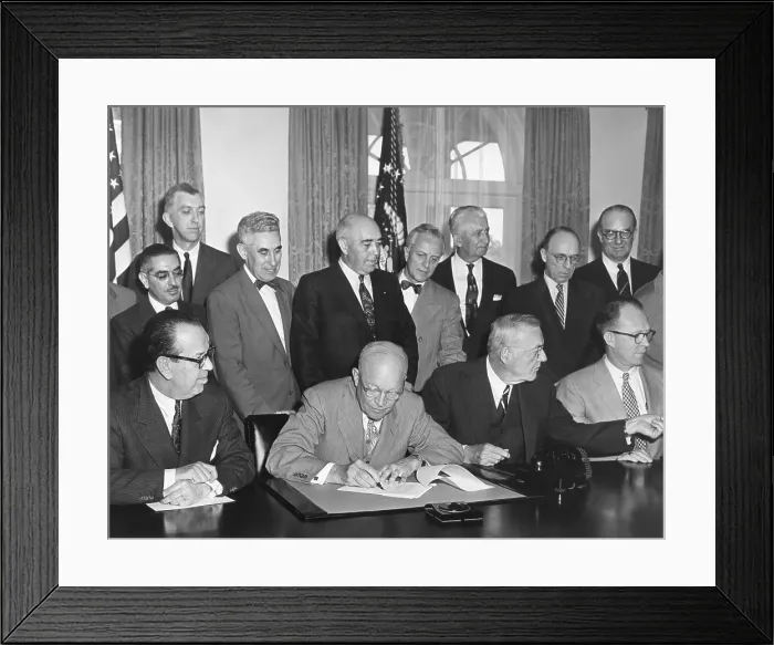 Framed Print : President Eisenhower initialing the first agreement for the Peaceful use of Atomic Energy. May 3, 1955