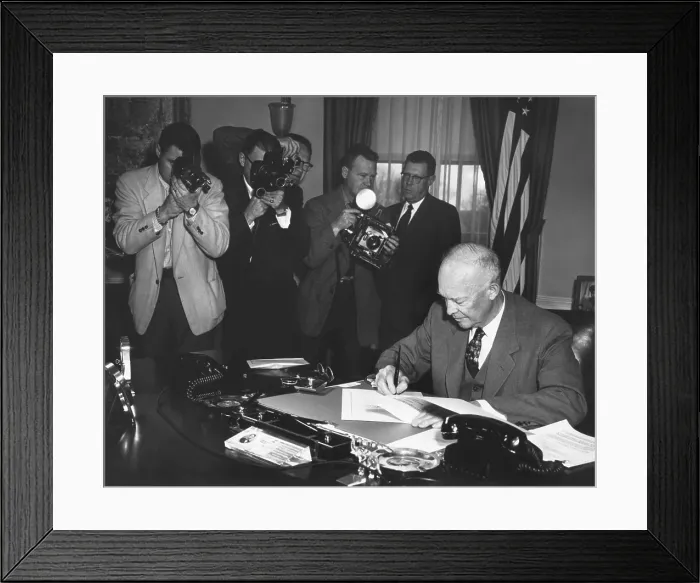 Framed Print : President Eisenhower signing a Resolution to Promote Peace and Stability in the Middle East