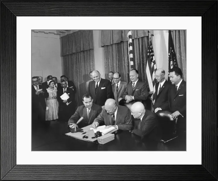 Framed Print : President Eisenhower signing a proclamation formally admitting Hawaii as the 50th state. Aug. 21, 1959. Vice President Nixon and Sam Raeburn also signed