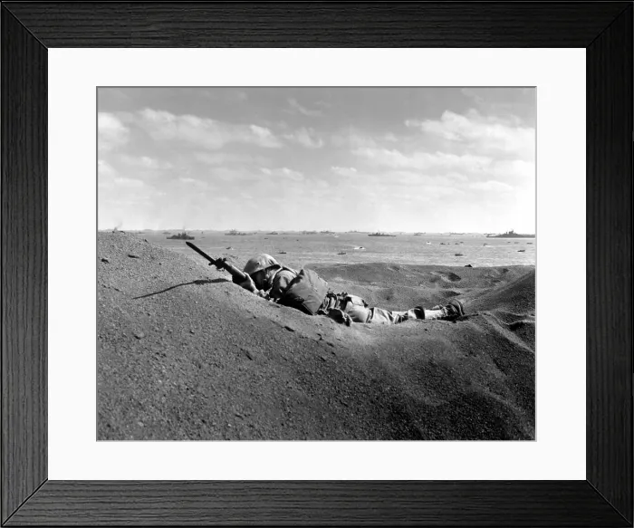 Framed Print : Dead U.S. Marine, his bayonet fixed, was killed by intense Japanese sniper fire on Iwo Jima. Feb. 19, 1945. World War 2. (BSLOC_2013_13_55)