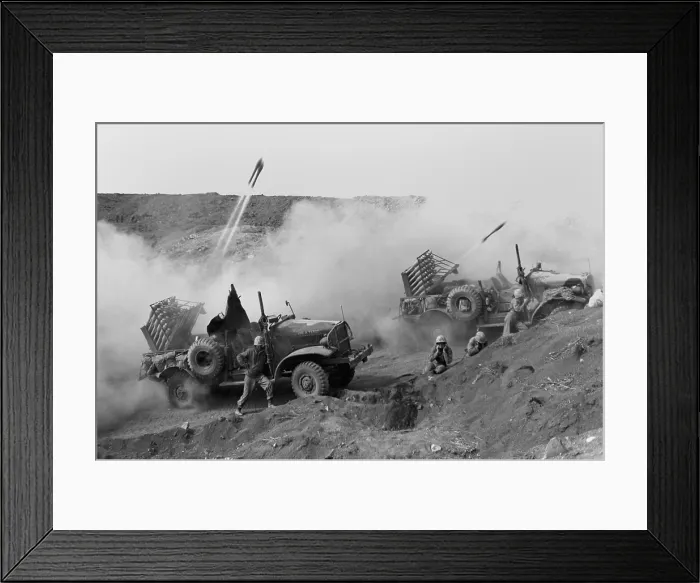 Framed Print : Marines launch rockets toward Japanese positions to support U.S. soldiers on Iwo Jima. The mobile rocket units employed hit and run tactics to escape enemy counterfire. Ca. Feb