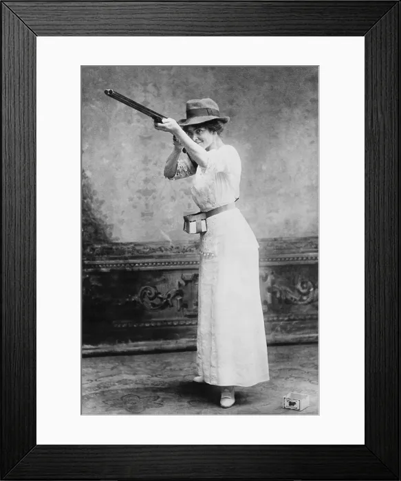 Framed Print : Woman posed with shotgun for trapshooting in 1914 Framed Print : Woman posed with shotgun for trapshooting in 1914